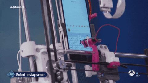 GIF of a robot typing on an smartphone.